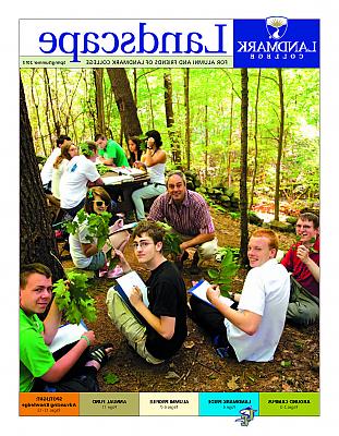 Cover image of 2013 issue of Landscape magazine, showing teacher and students in woods