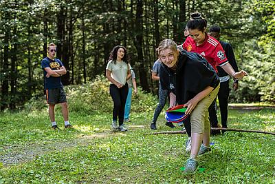 Landmark College students enjoy summertime engaging in a bit of frisbee tag.